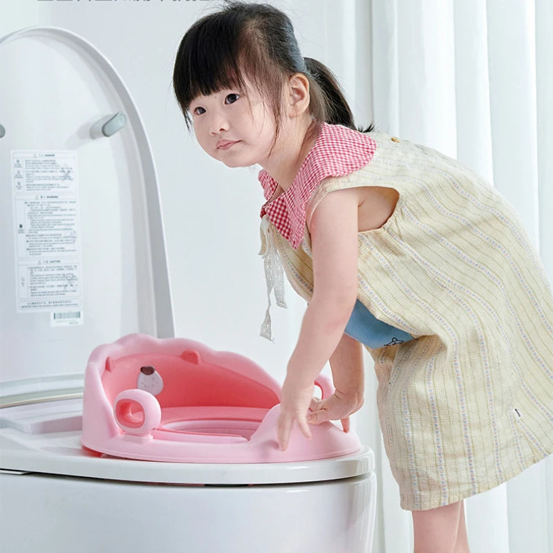 Asiento Reductor de Baño con Agarraderas – Comodidad y Seguridad para Niños